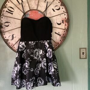 Blondie Nites size 11 black bodice floral skirting sheer side inset dress.